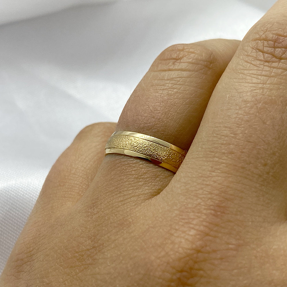 Pair of 18 karat gold earrings | Half Round Carved 5mm.