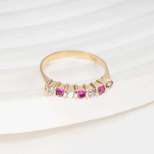 Anillo Medio Cintillo Rubíes y Circones en Oro 18k.