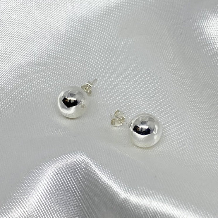 10mm ball earrings. in silver